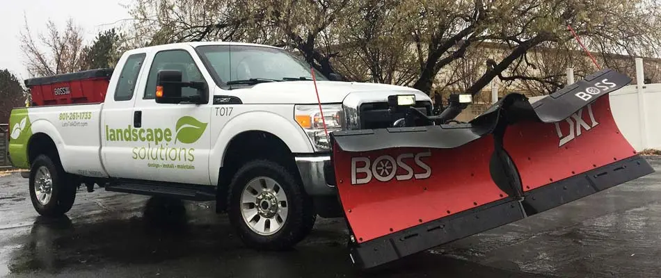 Our work truck in South Jordan with a Boss snow plow attached to the front.